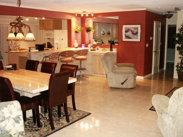 Dining table and breakfast bar at Magnolia Gardens